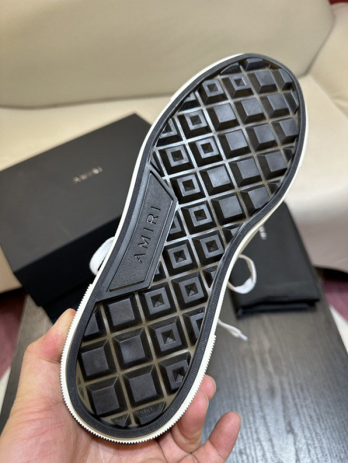 amiri* appliquéd leather and canvas sneakers