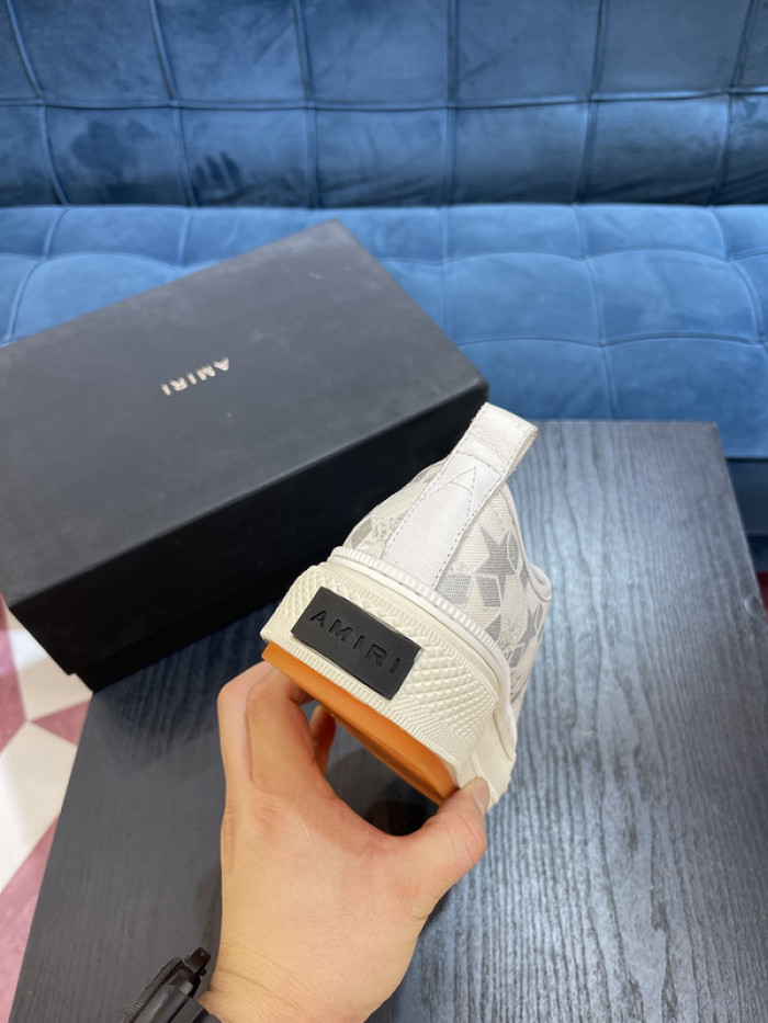 amiri* appliquéd leather and canvas sneakers