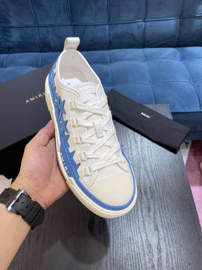 amiri* appliquéd leather and canvas sneakers