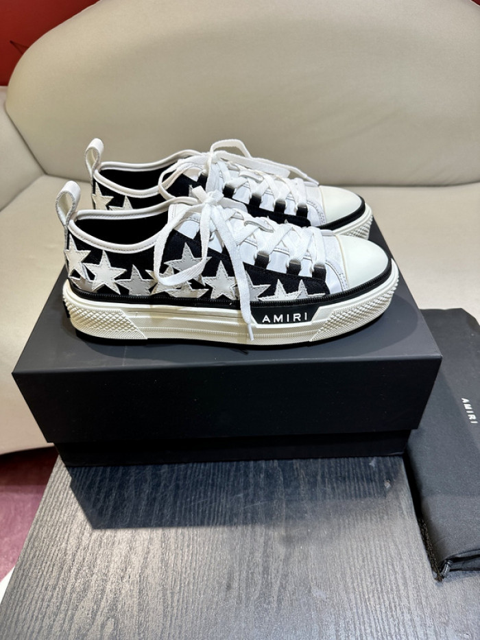 amiri* appliquéd leather and canvas sneakers