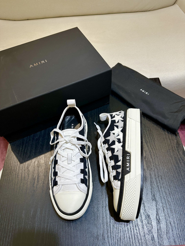amiri* appliquéd leather and canvas sneakers